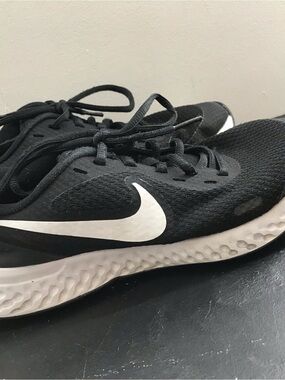 Nike Black and White Athletic Sneakers with Swoosh Accent